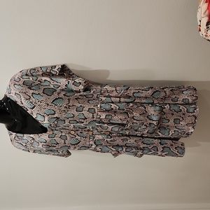 Swt V neck dress of soft crepe material with pink and pale turquoise snake print